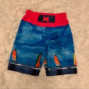Cat and Jack swim trunks. Size small (6/7)